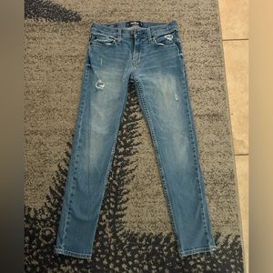 Hollister stretchy blue jeans with rips